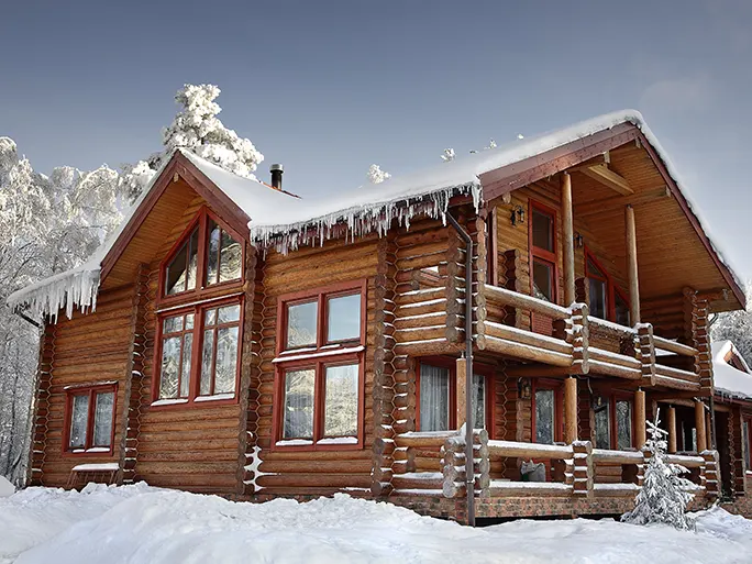 Log Cabin on the Snow