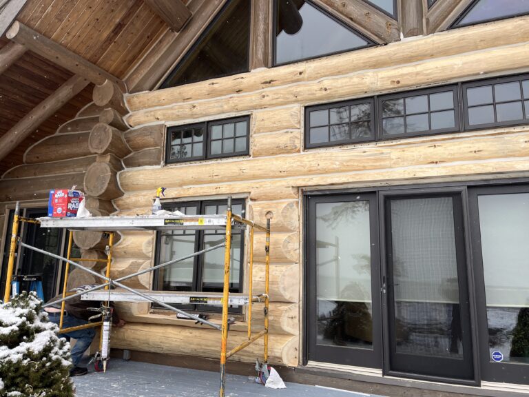 American Log Restoration: Expert log rot repair on a cabin exterior, ensuring long-lasting protection.