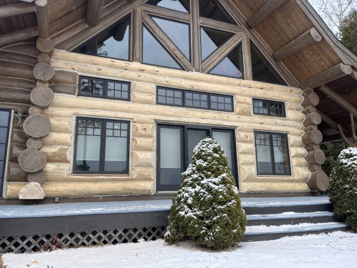 American Log Restoration: Expert log rot repair on a cabin exterior, ensuring long-lasting protection.